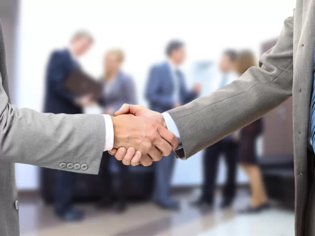 handshake isolated in office